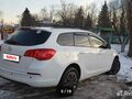 2014 Opel Astra J Рестайлинг, белый, 1100000 рублей - вид 4