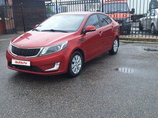 2012 Kia Rio 5-speed III, красный, 650000 рублей, вид 1