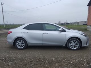 2014 Toyota Corolla XI (E160, E170, E180), серебристый, 1200000 рублей, вид 5