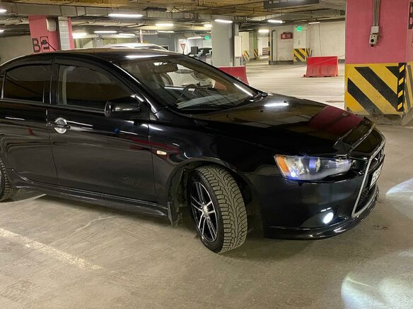 2011 Mitsubishi Lancer X Рестайлинг, чёрный, 870000 рублей - вид 4