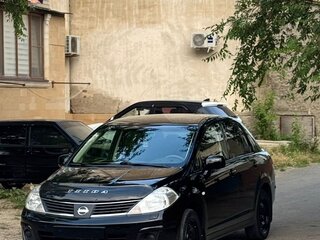 2010 Nissan Tiida I Рестайлинг, чёрный, 950000 рублей, вид 1