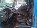 2010 Isuzu Elf (N-series), синий, 1600000 рублей - вид 7