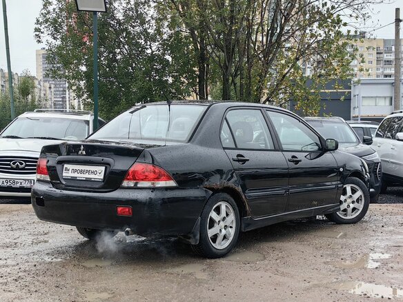 2004 Mitsubishi Lancer IX, чёрный, 149000 рублей - вид 8