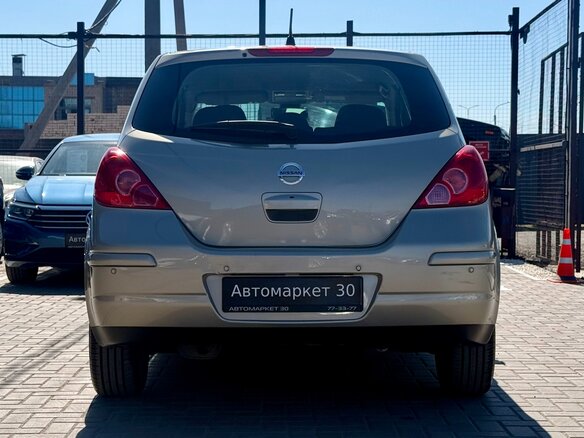 2010 Nissan Tiida I Рестайлинг, коричневый, 679990 рублей - вид 4