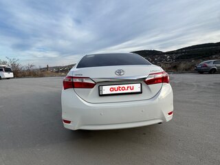2014 Toyota Corolla XI (E160, E170, E180), белый, 1290000 рублей, вид 4