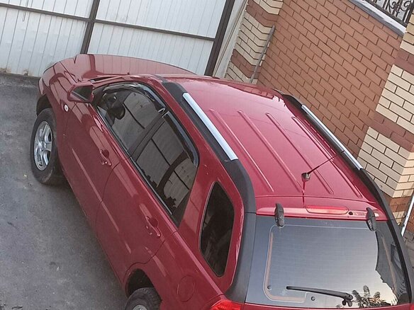 2008 Kia Sportage II, красный, 1350000 рублей - вид 4