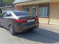 2014 Kia Rio III, коричневый, 790000 рублей - вид 2