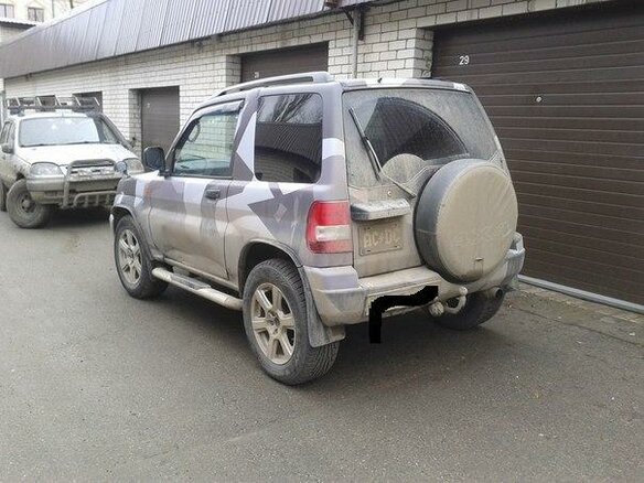 1999 Mitsubishi Pajero Pinin, серебристый - вид 3