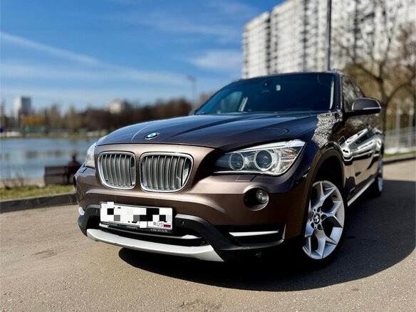 2012 BMW X1 20i I (E84) Рестайлинг, коричневый, 1350000 рублей - вид 10