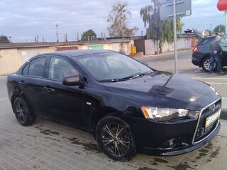 2014 Mitsubishi Lancer X Рестайлинг, чёрный, 900000 рублей, вид 1