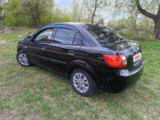2010 Kia Rio II Рестайлинг, чёрный, 560000 рублей, вид 4