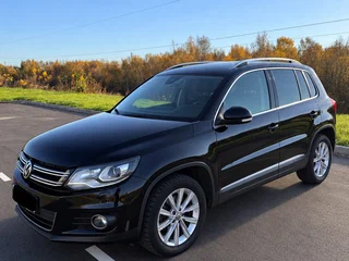 2014 Volkswagen Tiguan I Рестайлинг, чёрный, 1390000 рублей, вид 1