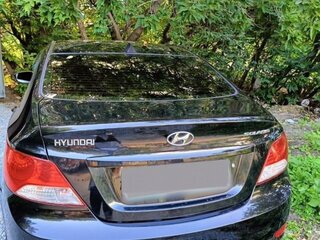 2013 Hyundai Solaris I, чёрный, 720000 рублей, вид 2