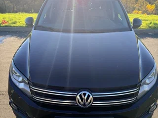 2014 Volkswagen Tiguan I Рестайлинг, чёрный, 1390000 рублей, вид 2