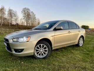 2010 Mitsubishi Lancer X, бежевый, 750000 рублей, вид 1