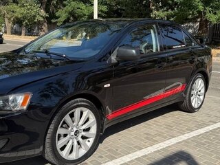 2010 Mitsubishi Lancer X, чёрный, 645000 рублей, вид 4