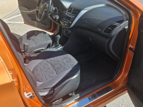 2015 Hyundai Solaris I Рестайлинг, оранжевый, 790000 рублей - вид 6