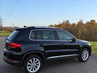2014 Volkswagen Tiguan I Рестайлинг, чёрный, 1390000 рублей, вид 3