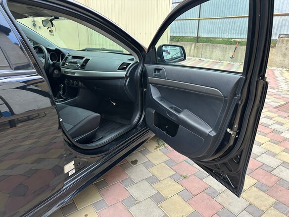 2012 Mitsubishi Lancer X Рестайлинг, чёрный, 650000 рублей - вид 8