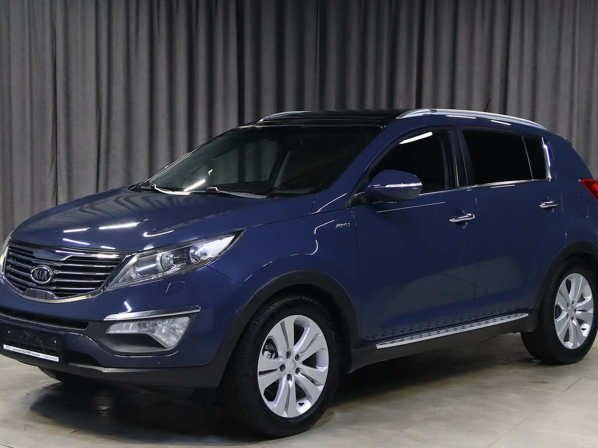 Открыть фотографии: Kia Sportage III