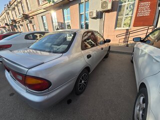 1995 Mazda Familia VII (BH), серый, 250000 рублей, вид 4