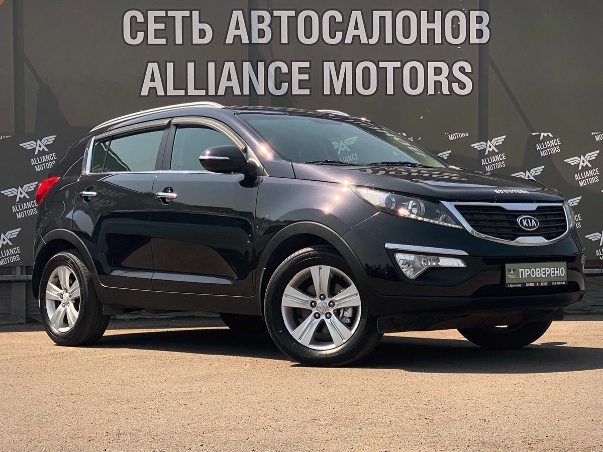 Открыть фотографии: Kia Sportage III