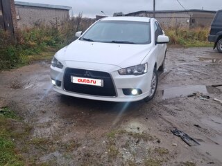 2012 Mitsubishi Lancer X Рестайлинг, белый, 615000 рублей, вид 2