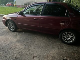 2006 Kia Spectra I Рестайлинг 2, красный, 260000 рублей, вид 4