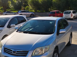2009 Toyota Corolla Axio X (E140, E150) Рестайлинг, серый, 750000 рублей, вид 1