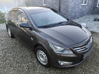 2015 Hyundai Solaris I Рестайлинг, коричневый, 870000 рублей, вид 3