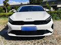 2023 Kia K3 II (China Market) Рестайлинг, белый - вид 1