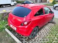 2006 Opel Corsa D, красный - вид 2