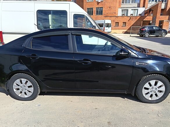 2014 Kia Rio 6-speed III, чёрный, 880000 рублей - вид 7