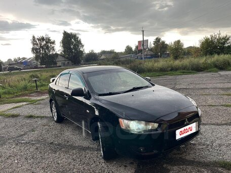 2010 Mitsubishi Lancer X, чёрный, 630000 рублей, вид 3