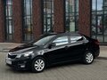 2016 Kia Rio III Рестайлинг, чёрный, 1050000 рублей - вид 2