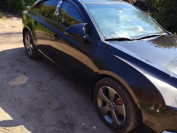 2011 Chevrolet Cruze I, чёрный, 625000 рублей - вид 8