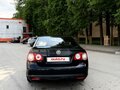 2009 Volkswagen Jetta V, чёрный - вид 2