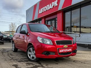 2011 Chevrolet Aveo I Рестайлинг, красный, 385000 рублей, вид 1
