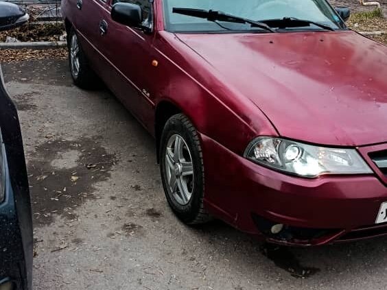 2012 Daewoo Nexia I Рестайлинг, пурпурный, 140000 рублей