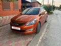 2015 Hyundai Solaris I Рестайлинг, оранжевый, 1079000 рублей