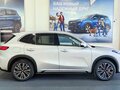 2026 Geely EX5 Гибрид EM-R, серебристый, 3829990 рублей - вид 1