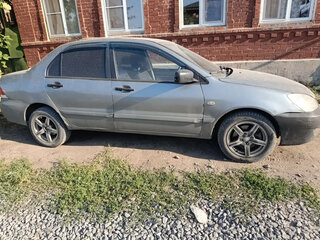 2006 Mitsubishi Lancer IX Рестайлинг, серебристый, 170000 рублей, вид 2