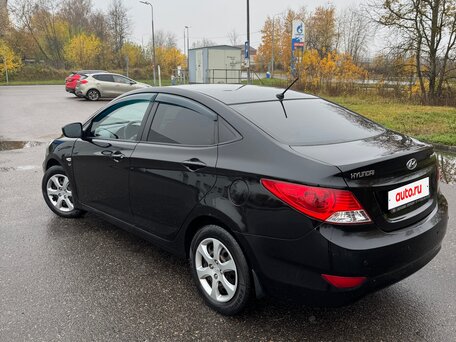 2011 Hyundai Solaris I, чёрный, 770000 рублей, вид 4