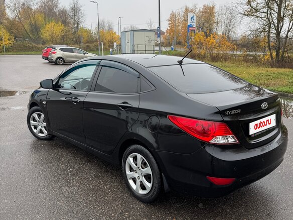 2011 Hyundai Solaris I, чёрный, 770000 рублей - вид 3