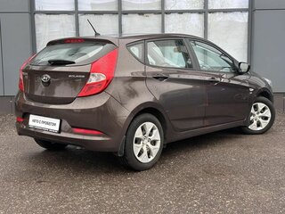 2015 Hyundai Solaris I Рестайлинг, коричневый, 919000 рублей, вид 4