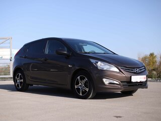 2015 Hyundai Solaris I Рестайлинг, коричневый, 865005 рублей, вид 3