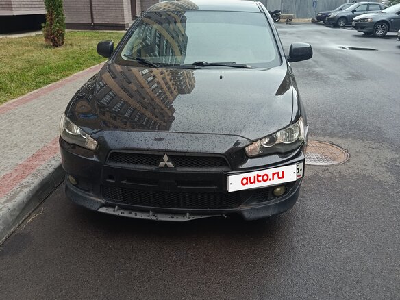 2007 Mitsubishi Lancer X, чёрный - вид 2