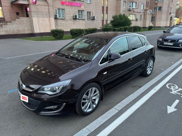 2014 Opel Astra J Рестайлинг, коричневый, 1360000 рублей
