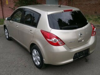 2010 Nissan Tiida I, золотистый, 650000 рублей, вид 1