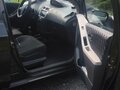 2009 Toyota Yaris II, чёрный, 600000 рублей - вид 1